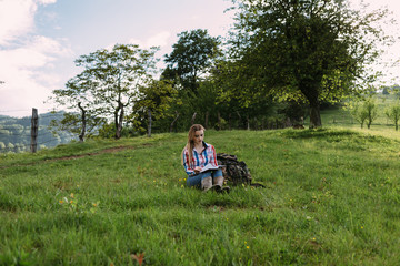 The girl stopped and lied and sat down to rest