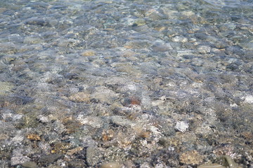 Stones under transparent seawater