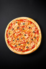 Pizza Margarita with tomatoes, basil, champignon mushrooms and cheese