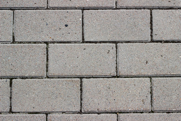 Concrete grey paving stones background 