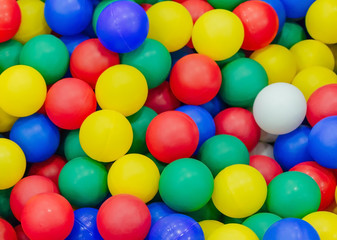 Fototapeta na wymiar Multi-colored plastic balls. A children's playroom. isolated on white background.