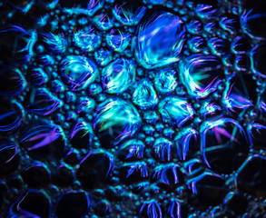 Abstract background, soap foam on the water surface.