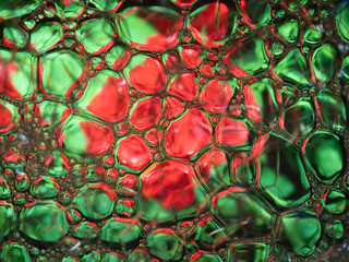 Abstract background, soap foam on the water surface.