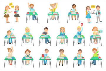 Fototapeta premium Children Sitting At School Desks In Class
