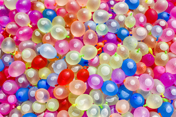 Colorful balloons filled with water. Texture of colorful balloons filled with water.