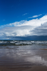 Big clouds above Baltic sea next to Liepaja, Latvia.