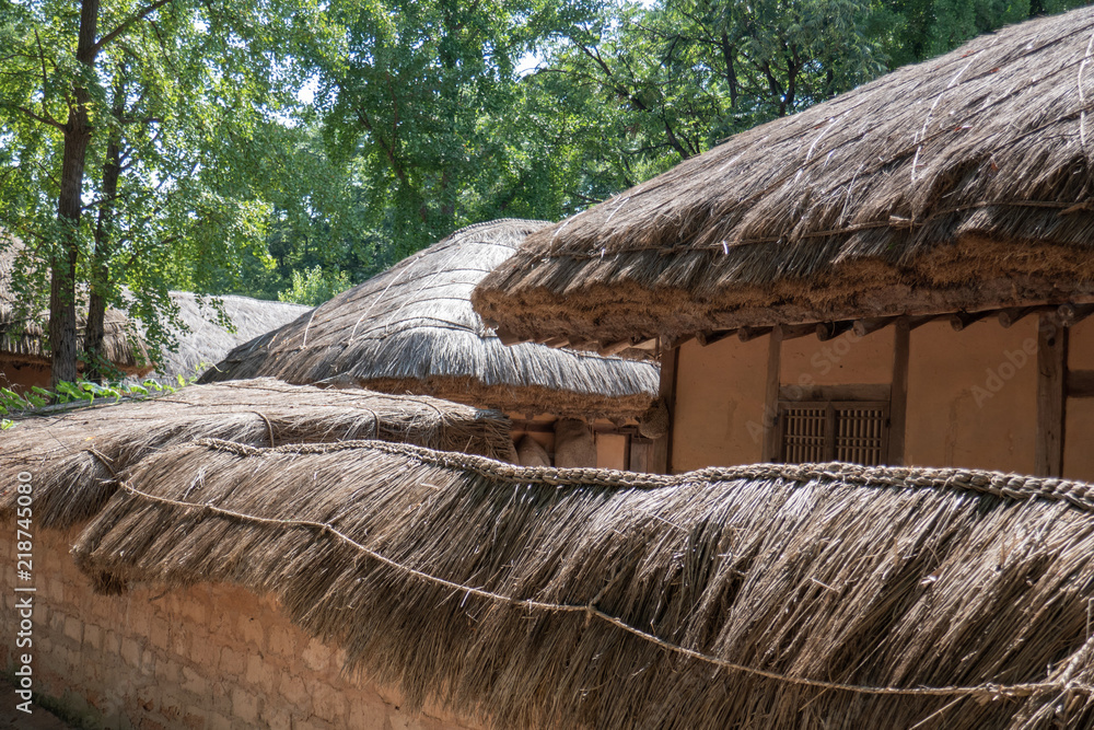 Wall mural Traditional Korean house with thatched roof