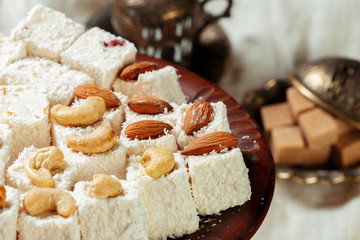Turkish delight on a wooden table.