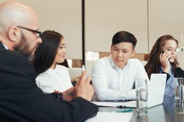 Business people working together at conference table