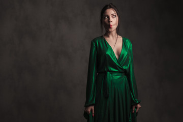 Naklejka premium funny elegant woman makes duck face and looks to side