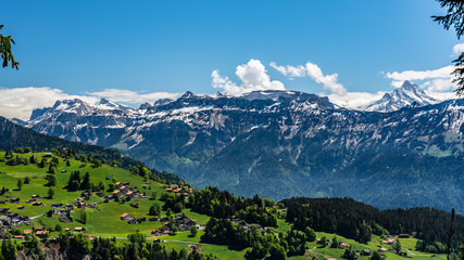 Switzerland, Beatenberg village and Alps view 