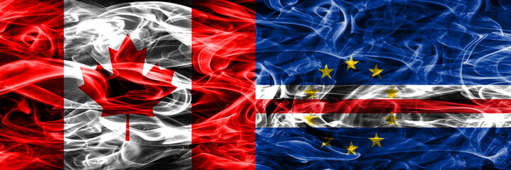 Obraz premium Canada vs Cape Verde smoke flags placed side by side. Canadian and Cape Verde flag together