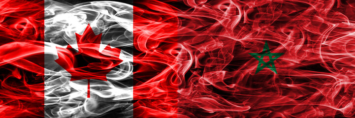 Canada vs Morocco smoke flags placed side by side. Canadian and Morocco flag together