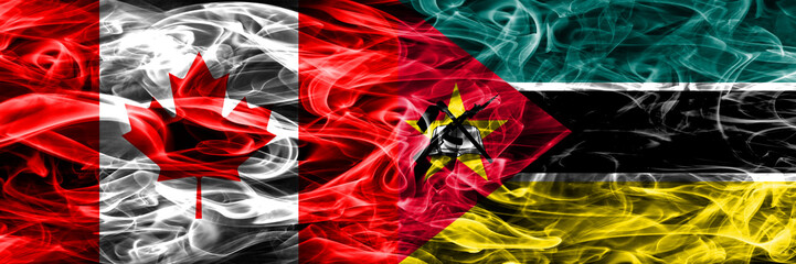 Canada vs Mozambique smoke flags placed side by side. Canadian and Mozambique flag together