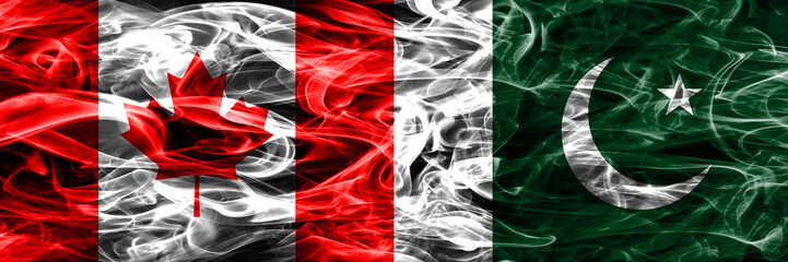 Canada vs Pakistan smoke flags placed side by side. Canadian and Pakistan flag together