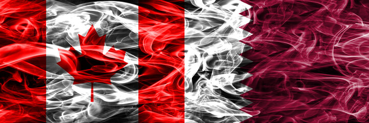 Canada vs Qatar smoke flags placed side by side. Canadian and Qatar flag together