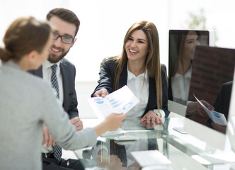 business team sitting at the Desk