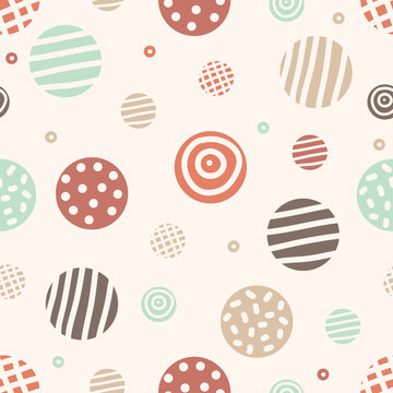 Seamless pattern with hand drawn colorful polka dots on texture background.