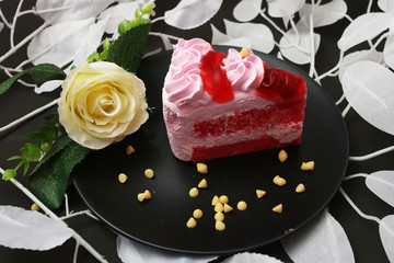 Obraz na płótnie Canvas Rose and strawberry jam topping on cake