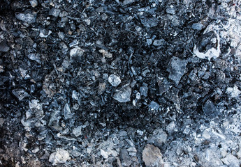 Dark grey and black ash coal background texture.