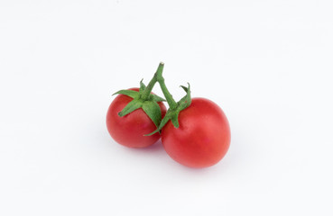 fresh, red, cherry tomatoes isolated. isolator of a pair of cherry. White background. fresh vegetables from the bed.