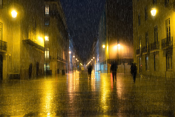 Rainy weather in the city at night, city street lights