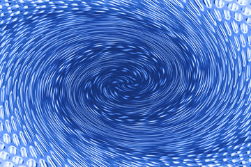 Space matter revolves around a spiral wormhole of cobalt color. Fantastic background image of...