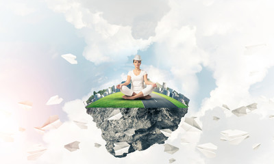 Young woman keeping mind conscious.