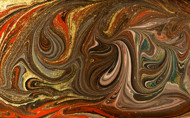 Gold marbling texture design. Red and golden marble pattern. Fluid art.