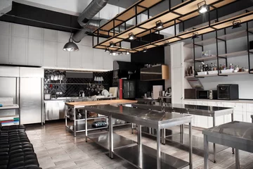 Gordijnen Interior of professional kitchen in restaurant © Pixel-Shot