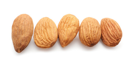 Tasty almonds on white background