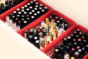 Manicure salon. On the table, nail polish and nail care products. The concept of beauty. Selective focus, copy space, close-up.