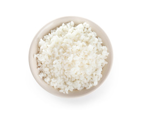 Bowl with freshly cooked rice on white background