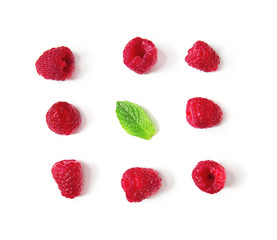 Fresh ripe raspberries with mint on white background