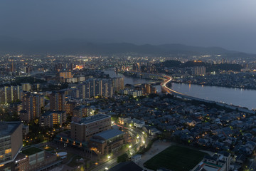 Night Landscape of Expressway across the river at fukuoka Fukuoka city in summer day.