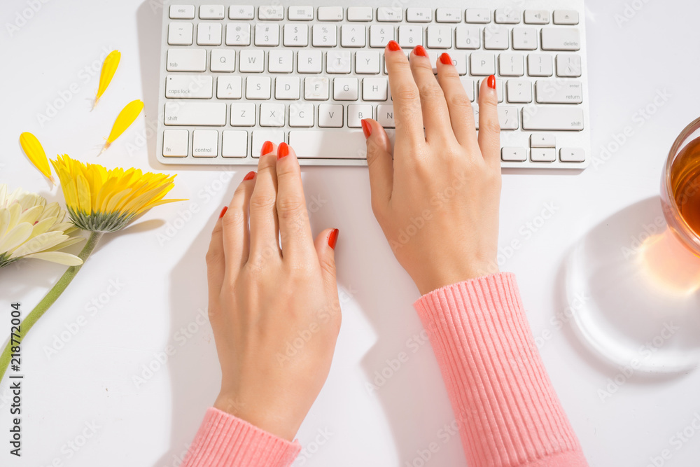 Poster women's hands on a computer keyboard close up - typing