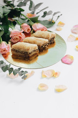 Baklava sweet dessert. Pastry made of layers of filo filled with chopped nuts and sweetened and held together with syrup or honey