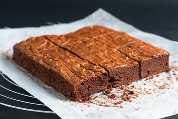 Homemade organic fudge and crispy brownies on baking sheet