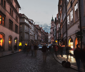 Fototapeta na wymiar Beautiful sunset in Prague old town with street lights