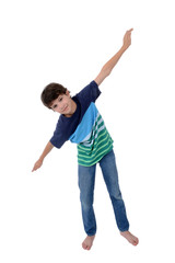 playful young boy with arms out isolated white background