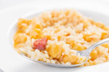 dish of homemade chickpeas on white wooden board