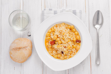 dish of homemade chickpeas on white wooden board