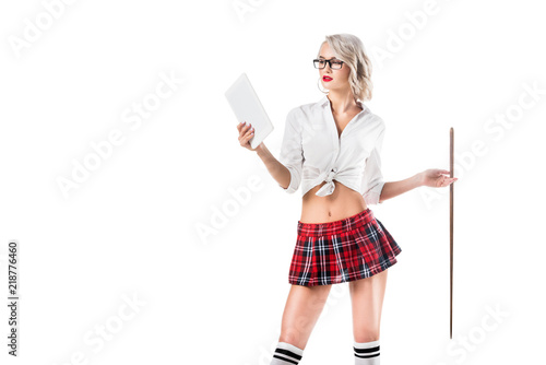 Portrait Of Seductive Schoolgirl In Short Plaid Skirt With Digital Tablet And Pointer Isolated On White Portrait Of Seductive Schoolgirl In Short Plaid Skirt With Digital Tablet And Pointer Isolated On White