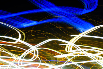 Speed motion abstract background in the dark night light lines with long exposure.