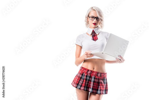 Portrait Of Young Woman In Seductive Schoolgirl Uniform With Laptop Isolated On White Portrait Of Young Woman In Seductive Schoolgirl Uniform With Laptop Isolated On White