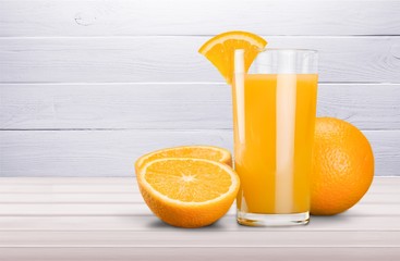 Orange Juice in glass on desk