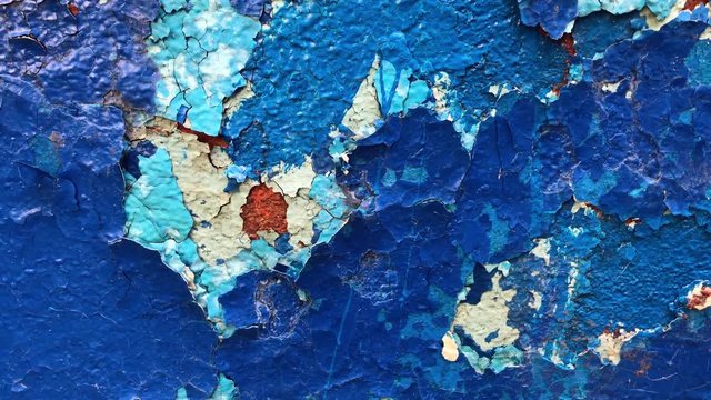 blue wall background with peeled plaster