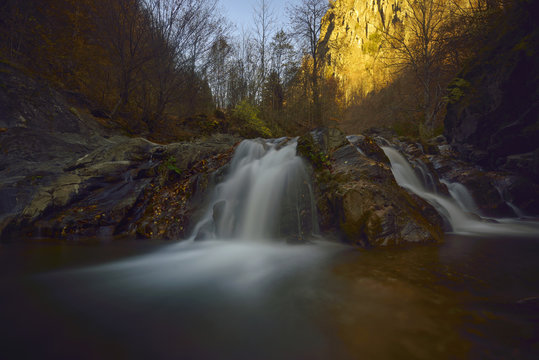 Autumn landscape with trees and river