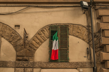 Italian window with flag, facade 
