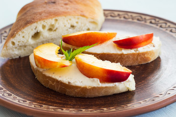Sandwiches with cream cheese and fruit. Breakfast. Homemade bread and sandwiches with cream cheese.